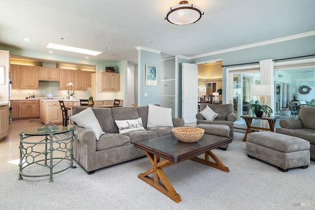 living area featuring ornamental molding and recessed lighting