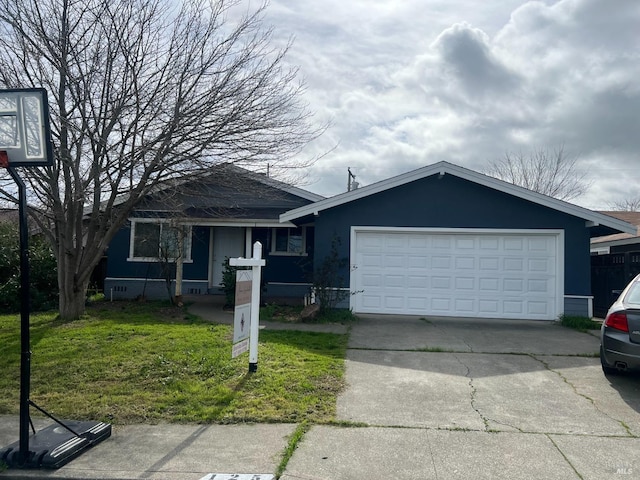 view of front of property with a garage, concrete driveway, and a front yard