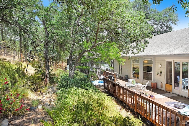 view of yard with a wooden deck