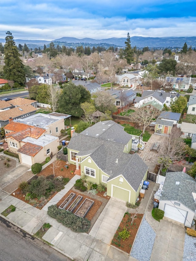 birds eye view of property featuring a residential view and a mountain view