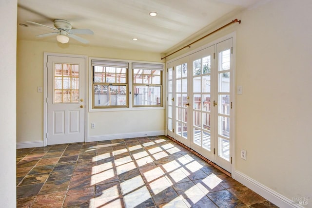 unfurnished sunroom with french doors