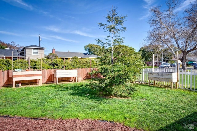 view of yard featuring fence