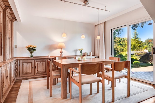 dining area with light wood-type flooring