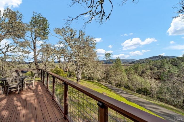 wooden terrace featuring a mountain view