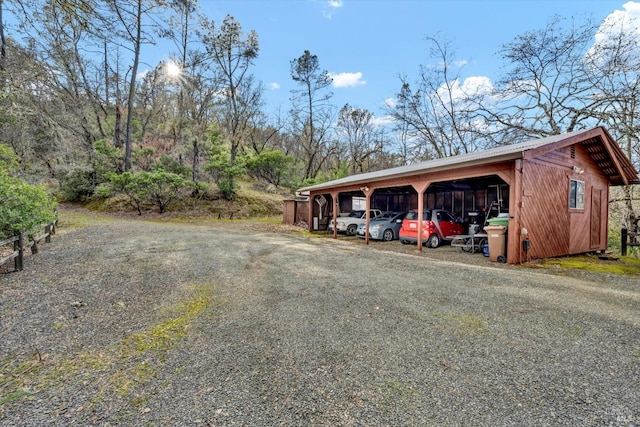 exterior space featuring a carport