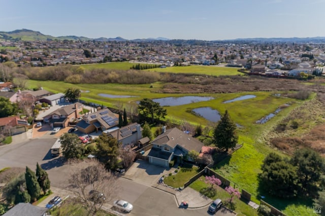 aerial view with a residential view and a water and mountain view