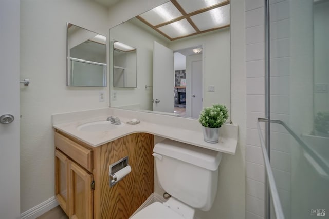 bathroom with toilet and vanity