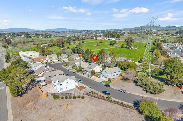 bird's eye view featuring a residential view and a mountain view