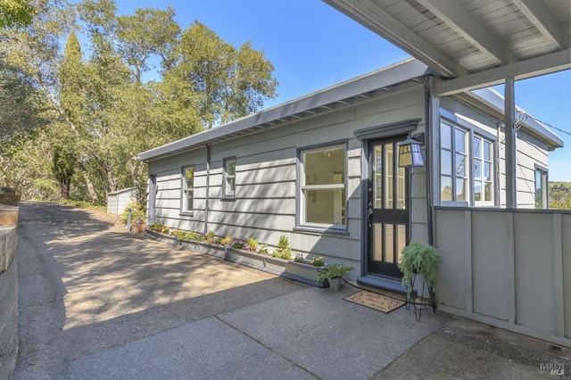 view of home's exterior with a patio area