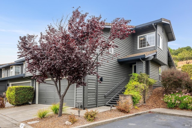 view of front of house with a garage and driveway