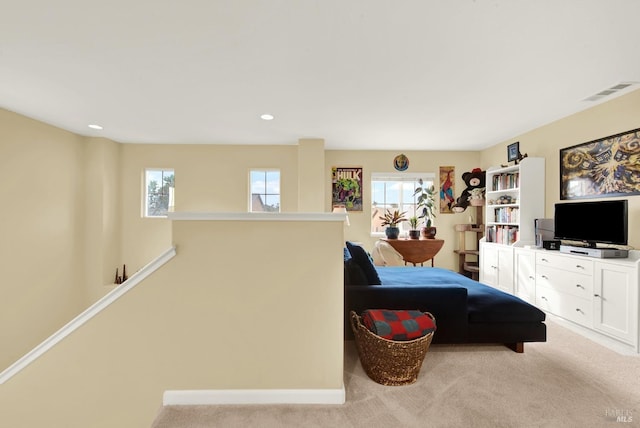 bedroom featuring light carpet, recessed lighting, visible vents, and baseboards