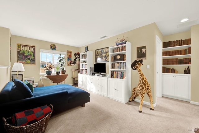 bedroom with light carpet, baseboards, and visible vents