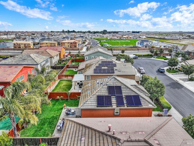 birds eye view of property with a residential view