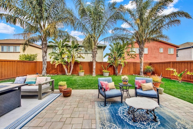 view of patio with a fenced backyard and outdoor lounge area