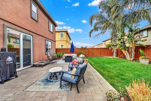 view of patio featuring a fenced backyard and an outdoor living space