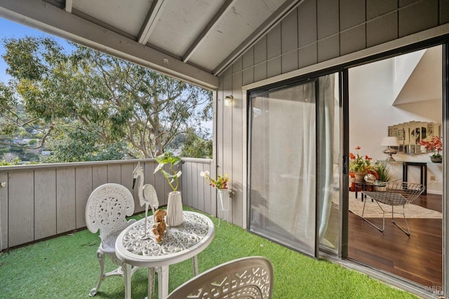 balcony featuring a sunroom