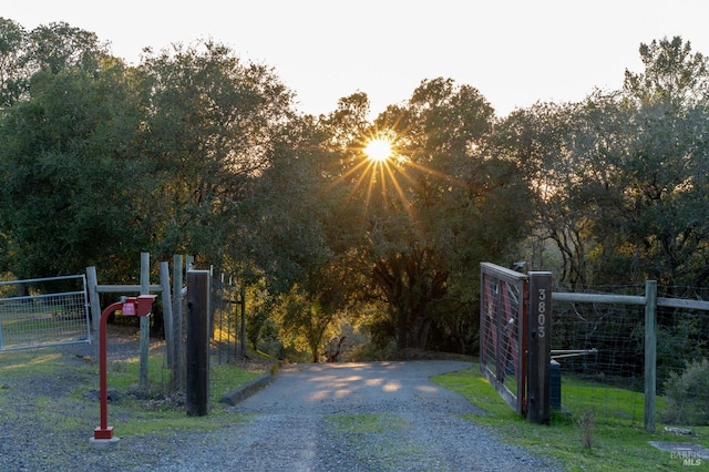 view of gate with fence