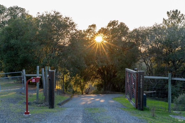 view of gate featuring fence