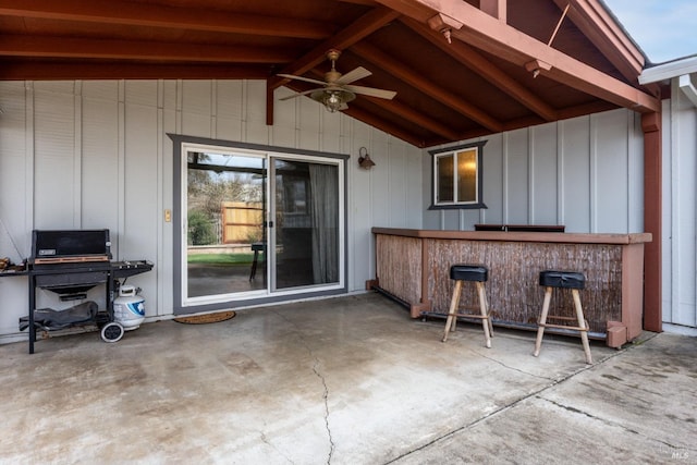 view of patio / terrace with a ceiling fan and outdoor dry bar