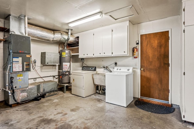 laundry room featuring separate washer and dryer, a sink, cabinet space, heating unit, and strapped water heater