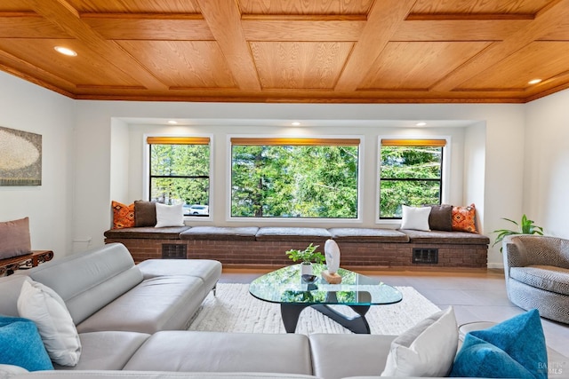 living room with wood ceiling, coffered ceiling, and plenty of natural light