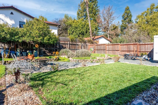 view of yard featuring a fenced backyard