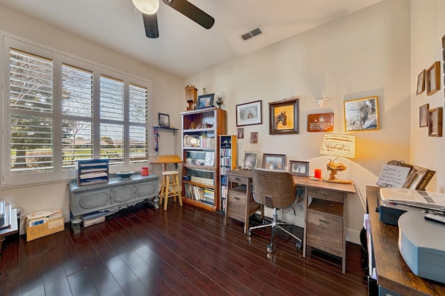 office area with wood finished floors, a ceiling fan, and visible vents