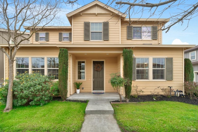 traditional home with a front yard