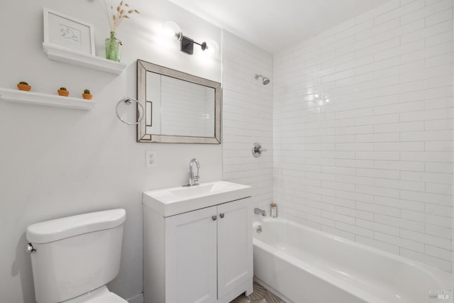 full bathroom with toilet, tub / shower combination, and vanity