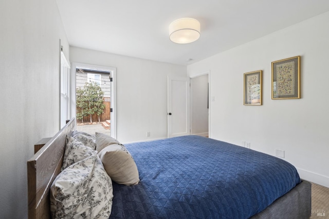 bedroom featuring carpet floors and baseboards