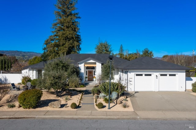 view of front of house featuring driveway and an attached garage