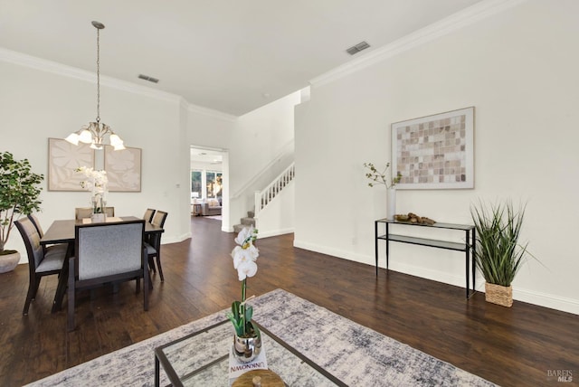 dining area with ornamental molding, dark wood-style flooring, and visible vents