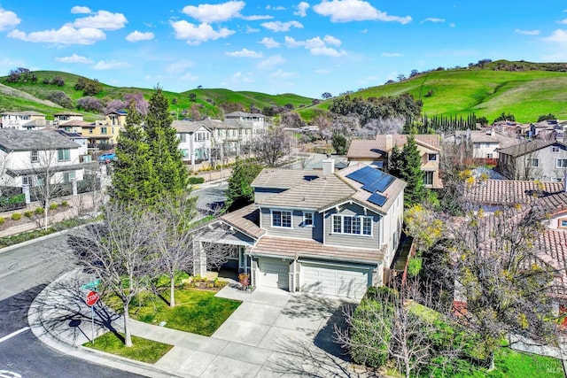 aerial view featuring a residential view and a mountain view