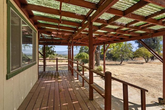 wooden terrace with a rural view