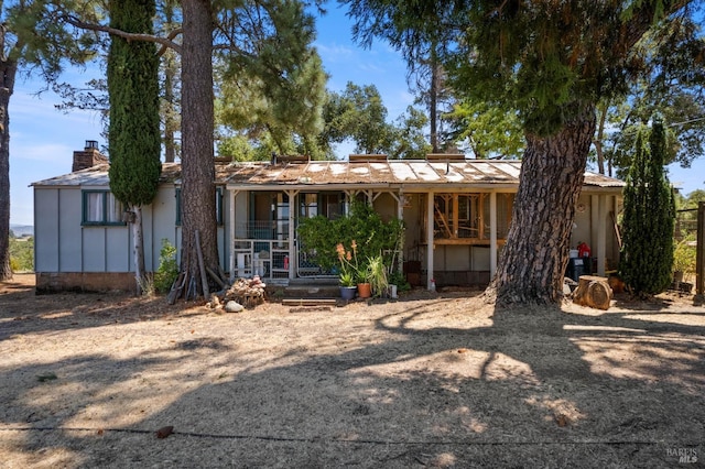 ranch-style house with a chimney