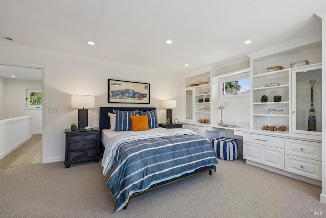 bedroom with recessed lighting, baseboards, crown molding, and light colored carpet