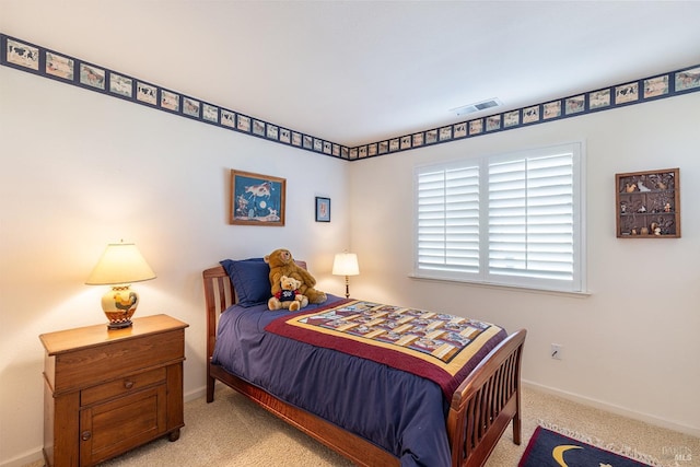 bedroom featuring light colored carpet, visible vents, and baseboards