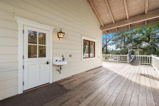 wooden terrace with a sink