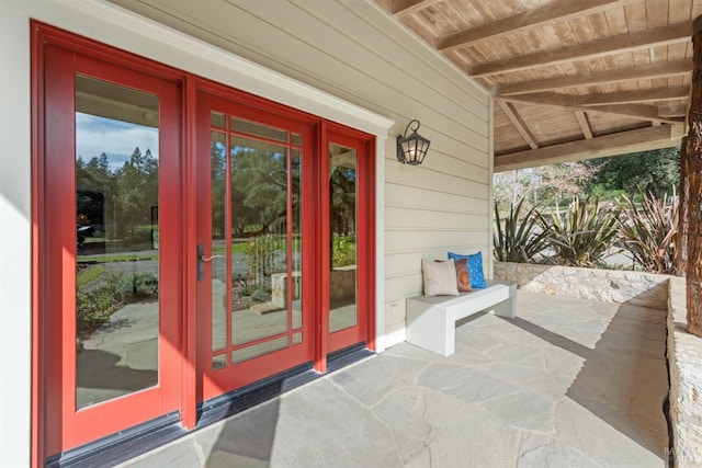 doorway to property with a patio area