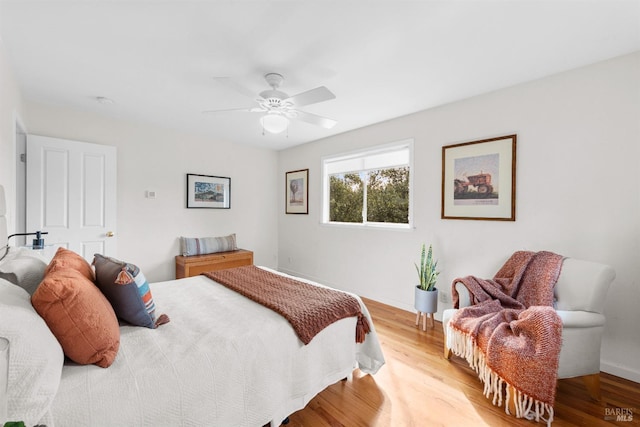 bedroom featuring ceiling fan and wood finished floors