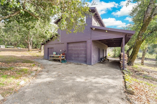 garage with a carport