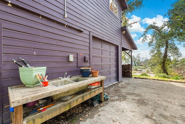 view of property exterior with a garage