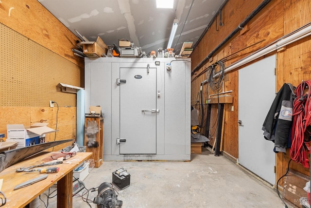 basement with a workshop area