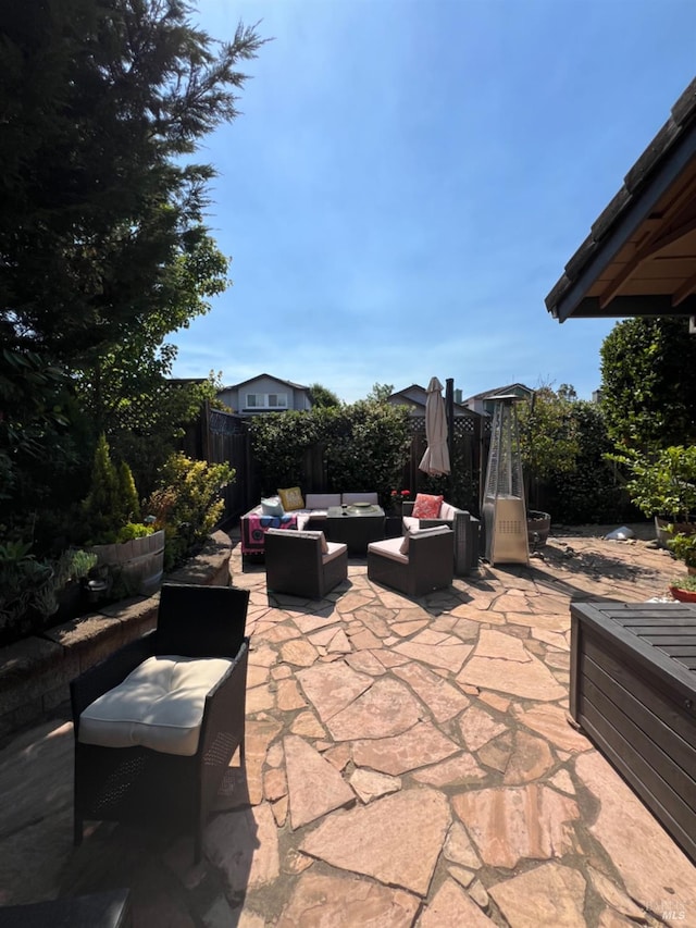 view of patio / terrace featuring outdoor lounge area and a fenced backyard