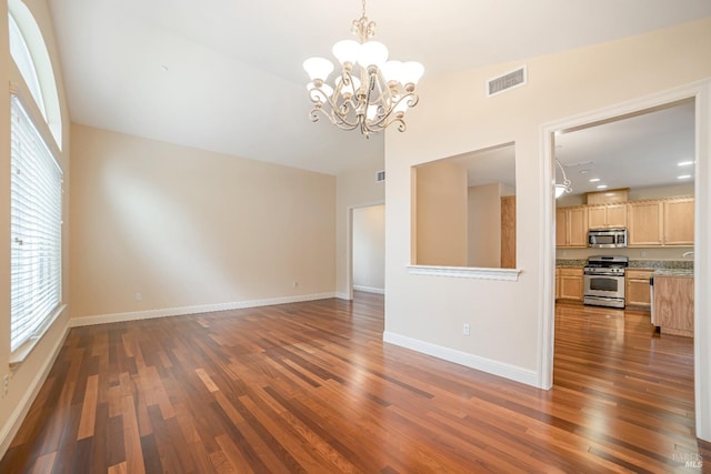 interior space featuring dark wood-style floors, visible vents, and baseboards