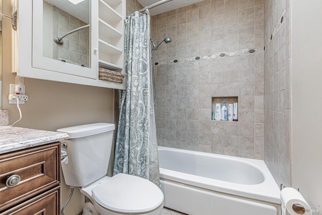 bathroom with toilet, shower / bath combo with shower curtain, and vanity