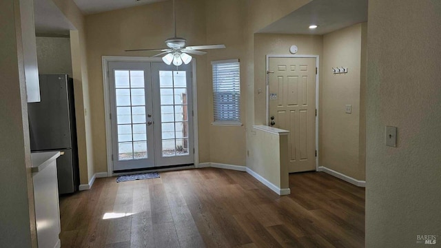 doorway to outside with french doors, wood finished floors, and baseboards