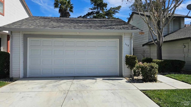 garage with driveway