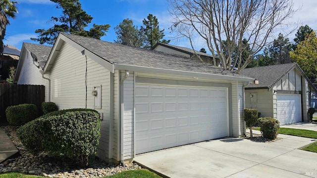 garage featuring fence