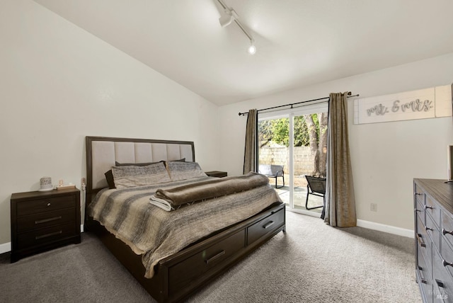 carpeted bedroom with lofted ceiling, rail lighting, access to outside, and baseboards